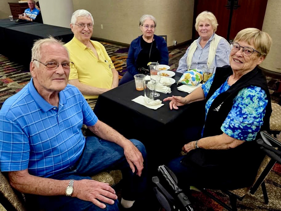 Catching up with friends at the Friday silent auction/reception
