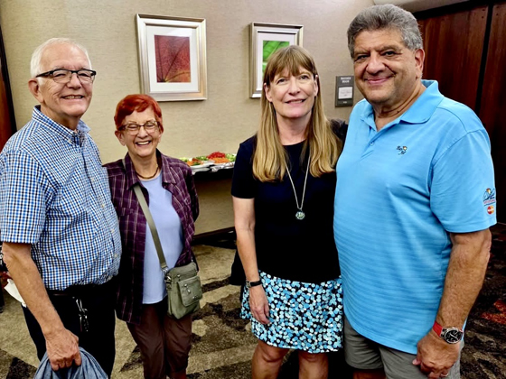 Catching up with friends at the Friday silent auction/reception